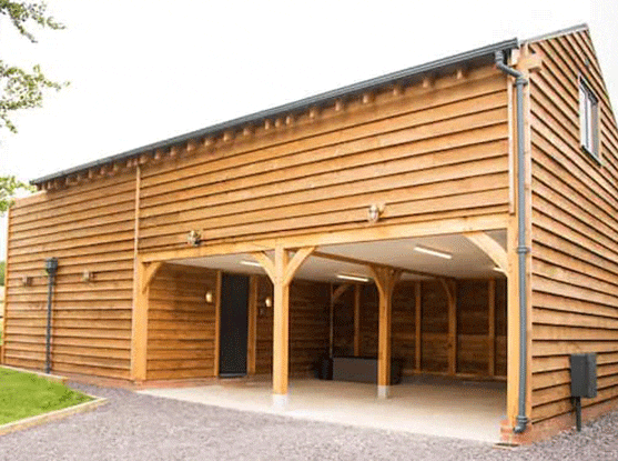 oak framed garage build with room above