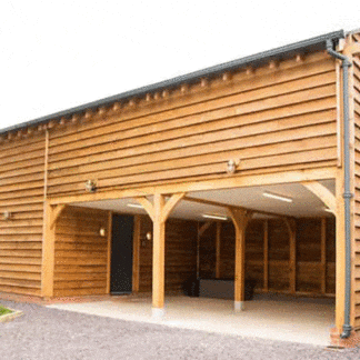 oak framed garage build with room above